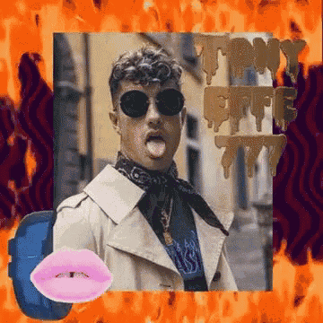 a man wearing sunglasses and a trench coat is sticking his tongue out in front of a sign that says tiny coffee 777