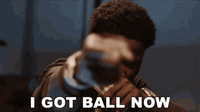 a man says i got ball now while holding a bottle