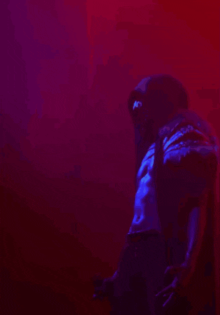 a blue background with a statue of a man in it