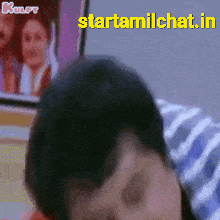a gif of a man talking on a cell phone with the website starttamilchat.in written on the bottom