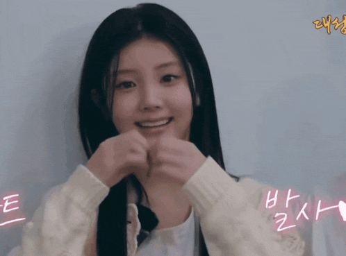 a girl with korean writing on the bottom of her face