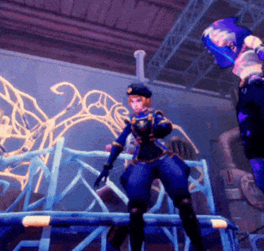 a woman in a blue outfit is standing on a blue railing