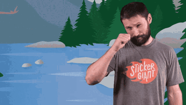 a man with a beard wearing a sticker giant shirt