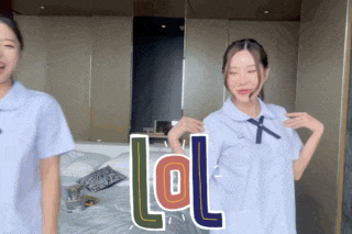 two girls standing next to each other with lol written on the bottom right