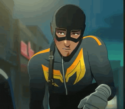 a man in a superhero costume is wearing a mask .