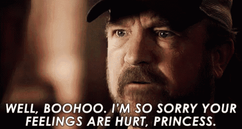 a man with a beard and a hat is saying well boohoo i 'm so sorry your feelings are hurt