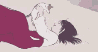 a cartoon girl is laying on the floor with a cat on her lap .