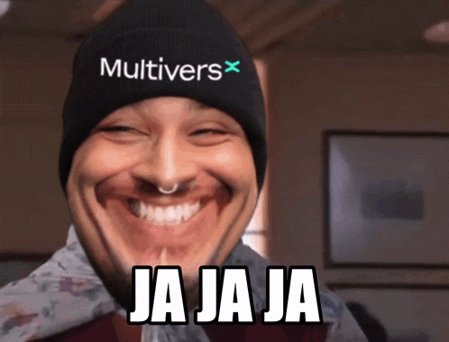 a man wearing a beanie that says multivers x