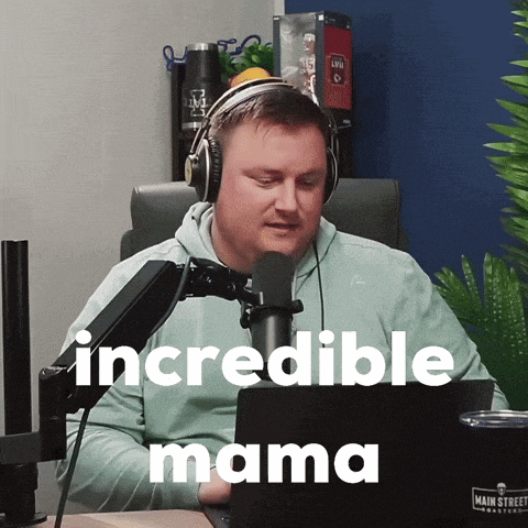 a man wearing headphones sits in front of a microphone with the words " incredible mama " on the screen
