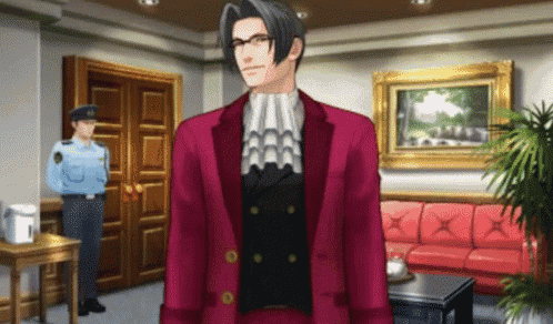 a man in a red suit is standing in a room