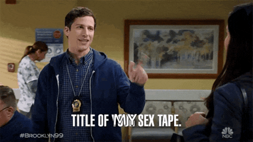 a man in a blue jacket is talking to a woman and says title of your sex tape
