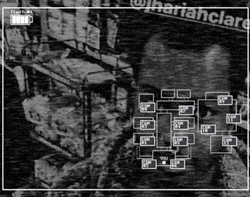 a black and white photo of a man 's face in a store with a lot of squares on it .