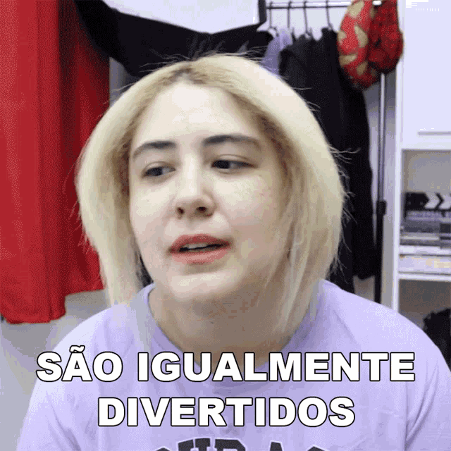 a woman wearing a purple shirt with sao igualmente divertidos written on it