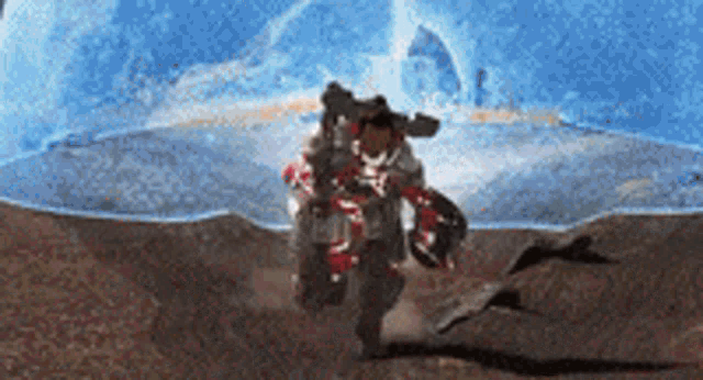 a video game character is running through a desert with a blue background behind him .
