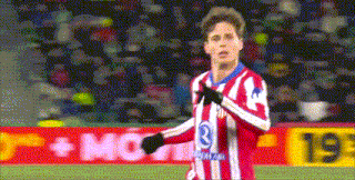 a soccer player in a red and white striped jersey with the number 3 on it