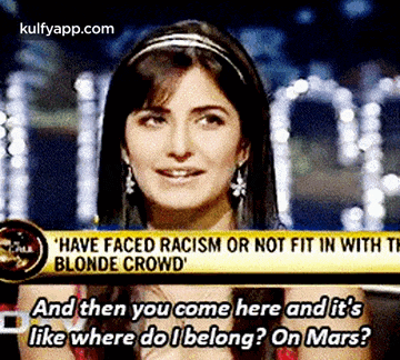 a woman is talking on a tv show about racism