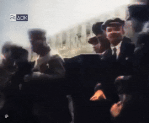 a blurry picture of a group of people with the letters 24 aok in the corner