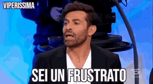 a man with a beard says sei un frustrato