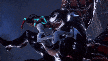 a spiderman is being attacked by a venom monster
