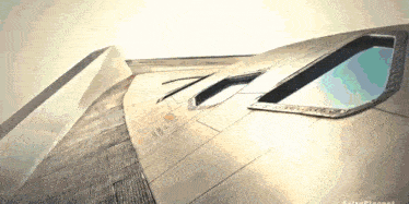 a close up of a plane 's wing with the words astroplaneet written on the bottom