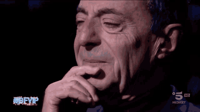 a close up of a man 's face with the words 5 hd on the bottom