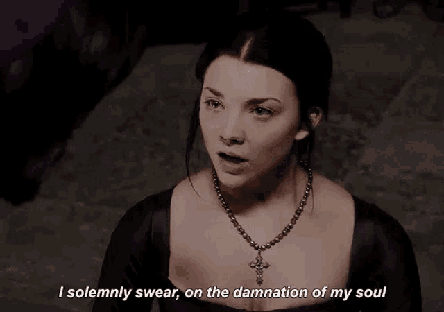 a woman wearing a black dress and a necklace is saying i solemnly swear on the damnation of my soul