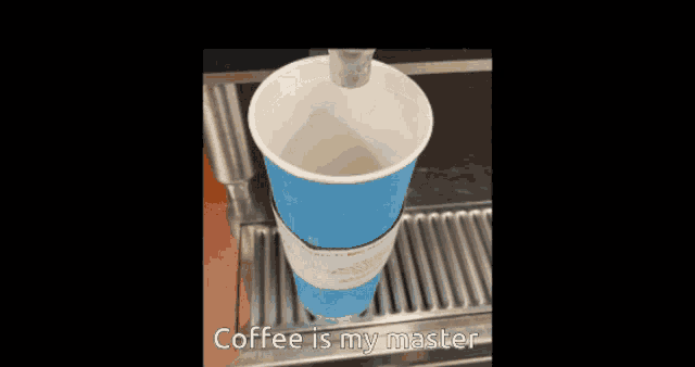 a cup of coffee is being poured into a machine and the words coffee is my master are below it