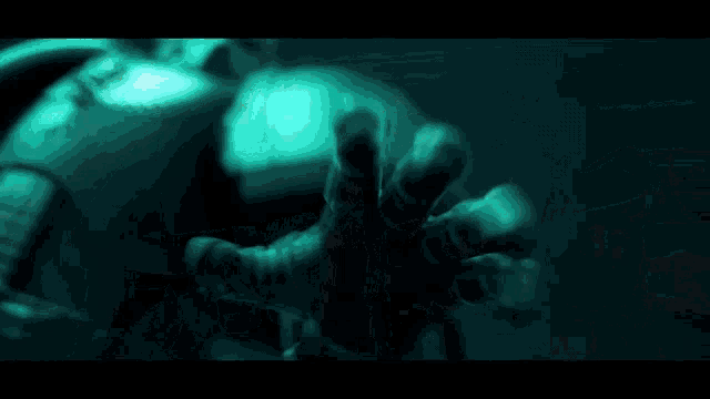a person with a green light coming out of their eyes