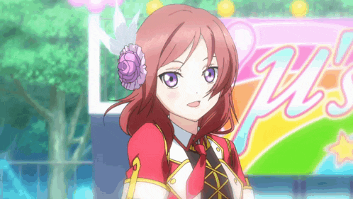 a girl with red hair and purple eyes stands in front of a sign that says ' w 's ' on it
