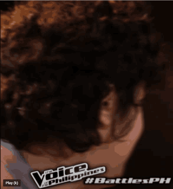 a blurred image of a person with the words the voice of the philippines on it