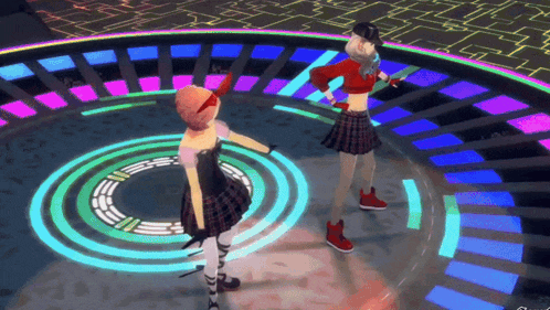 two girls are dancing on a stage with a circle of lights surrounding them