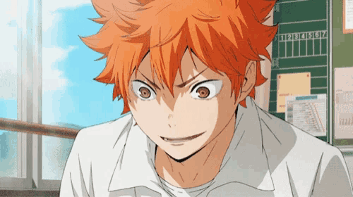 a close up of a person 's face with orange hair and a white shirt