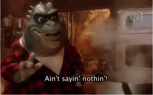 a dinosaur says ain 't sayin ' nothin ' while standing in front of an oven