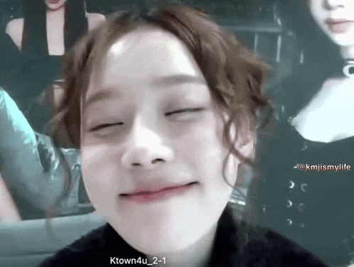a close up of a woman making a funny face with the hashtag ktown4u 2-1