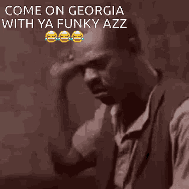 a man holding his hand to his forehead with the words come on georgia with ya funky azz below him