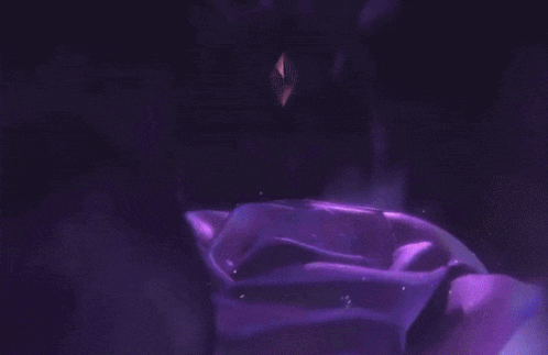 a purple swirl is coming out of a metal pole
