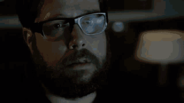 a man with glasses and a beard is talking about an excellent question