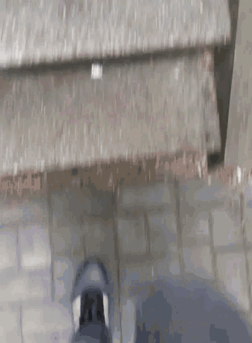 a person is walking down a set of steps