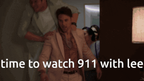 a man in a suit is being helped by a nurse and says time to watch 911 with lee