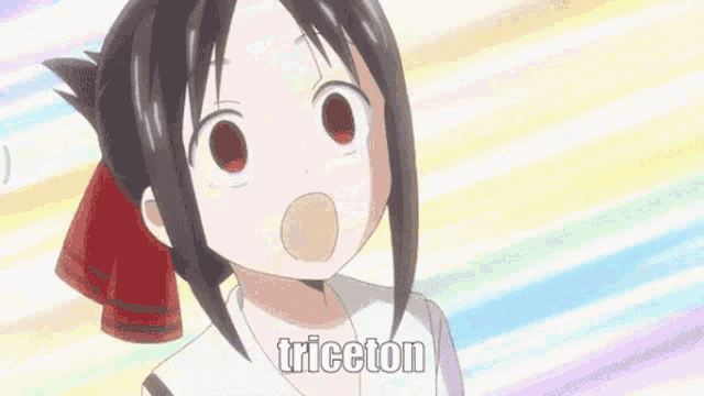 a girl with a red bow in her hair is making a funny face and says triceton .