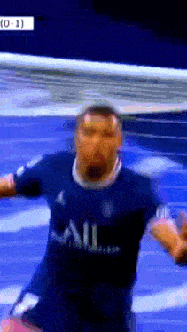 a soccer player wearing a jersey that says all is celebrating a goal