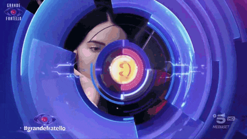 a woman 's face is surrounded by blue circles and the words grande fratello
