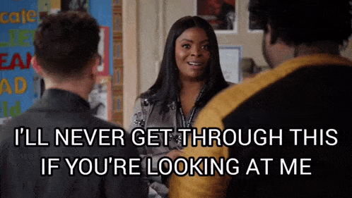 a woman is talking to two men and says " i 'll never get through this if you 're looking at me