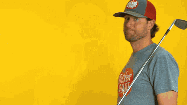 a man holding a golf club in front of a yellow background with the words of office on it