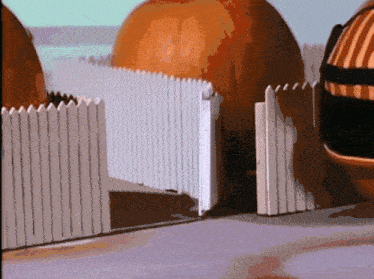 a white picket fence surrounds a large orange ball in a cartoon scene