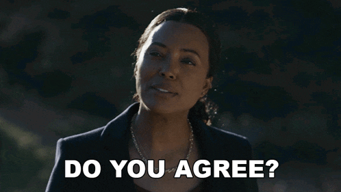 a woman says " do you agree " in front of a dark background