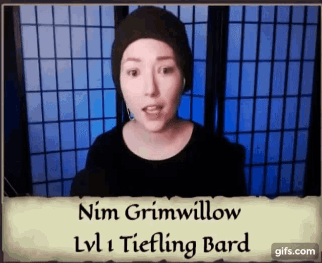 a woman in a black hat with the name nim grimwillow on it