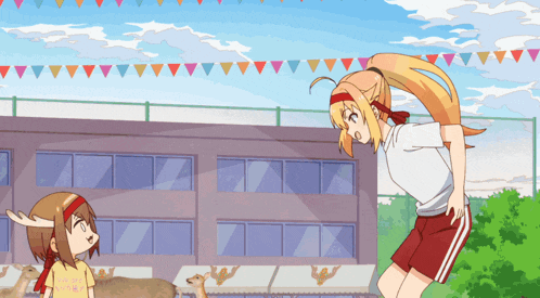 a girl in a white shirt and red shorts is standing next to a girl with antlers on her head
