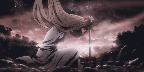 a woman in a white dress is kneeling down with a sword