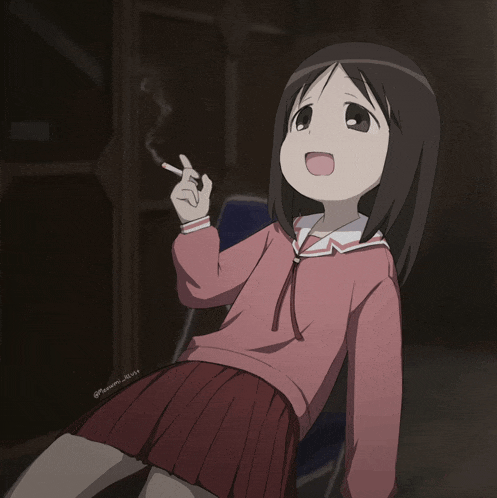 a girl in a pink sweater and red skirt is smoking a cigarette in a dark room